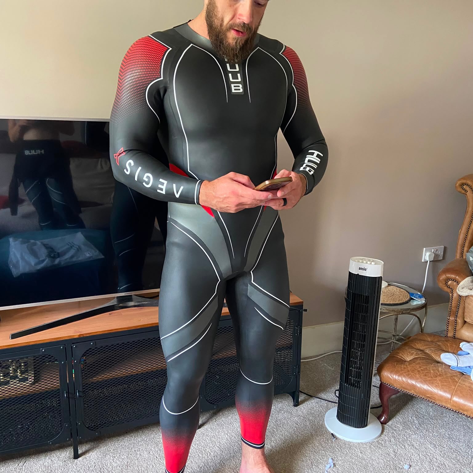 Connor in a wetsuit before an open-water swim